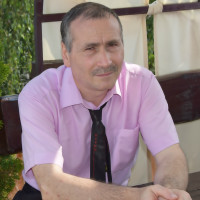 author Emilus Ghinda